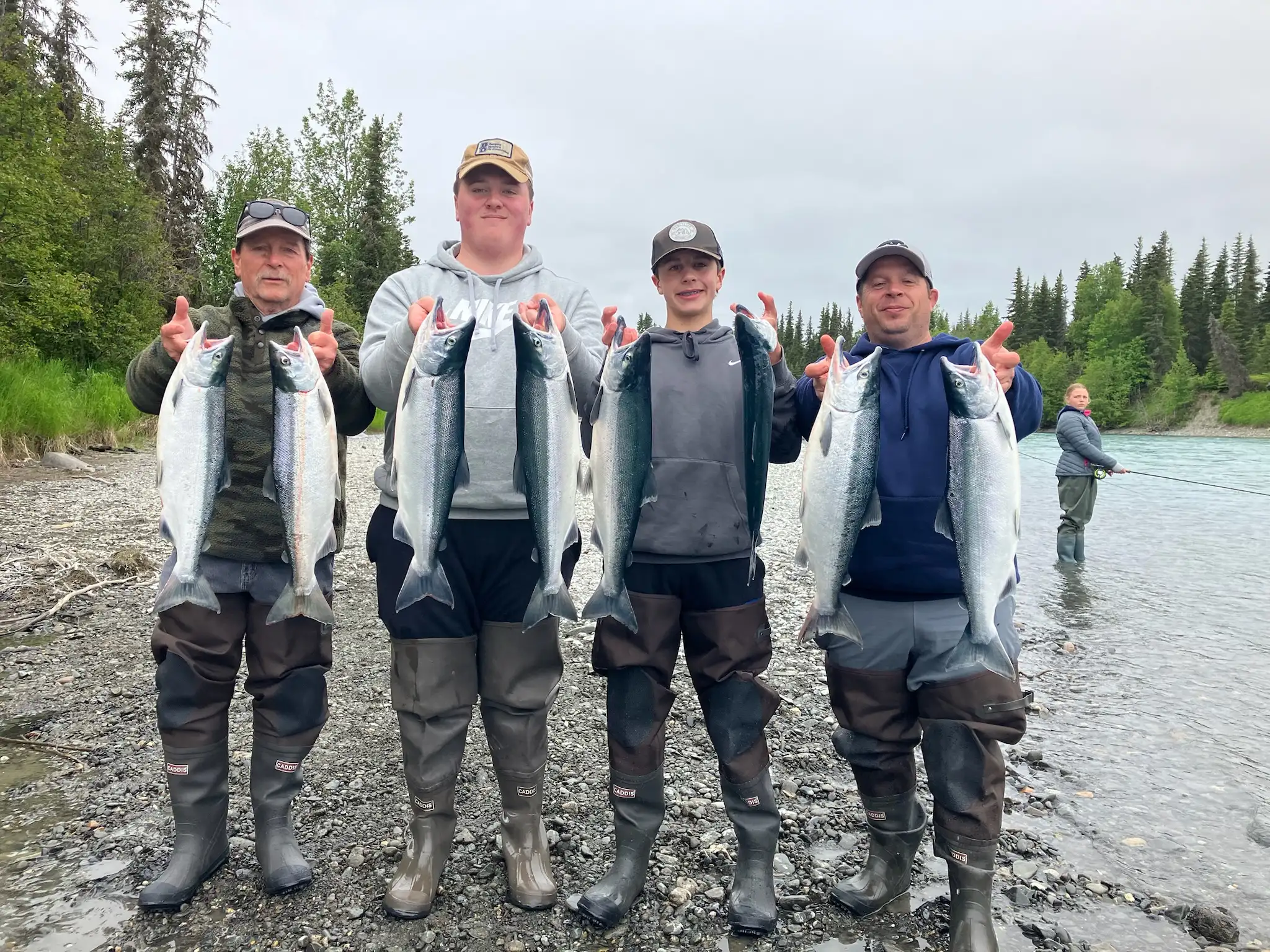 4 people with 2 fish